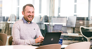 Staff member at laptop